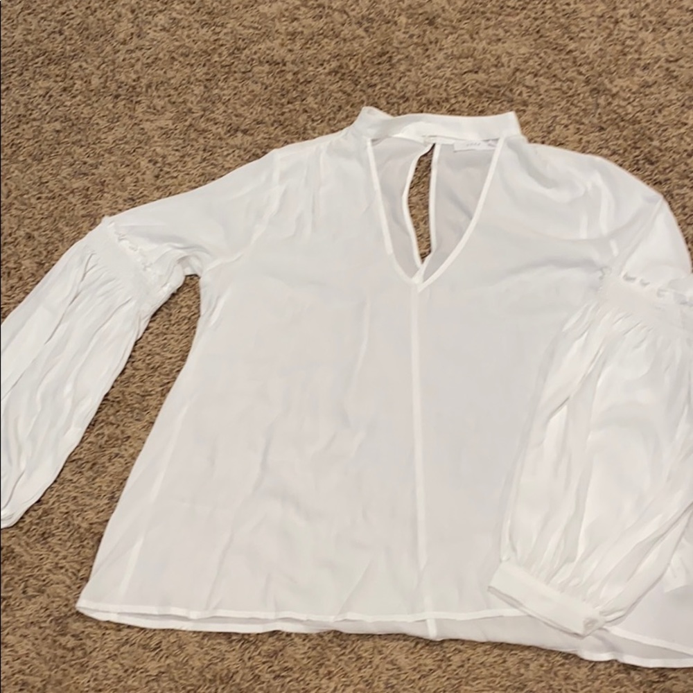 Lush sheer flowy white top with fun arms